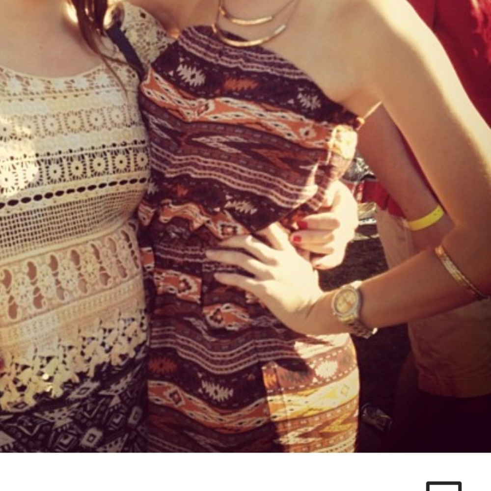 Romper with pockets and waist ties